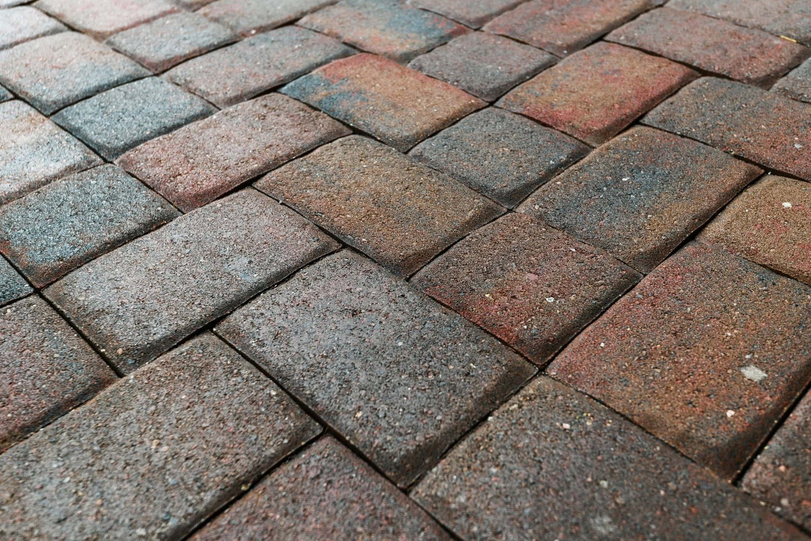 A close up of a brick walkway.